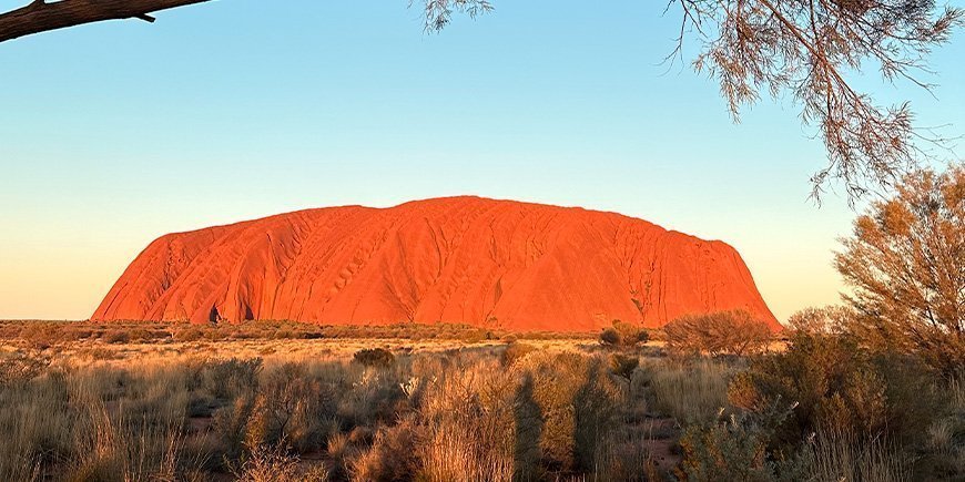 Uluru in de zonsondergang