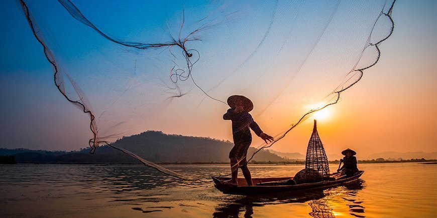 Visser in de Mekong in Vietnam